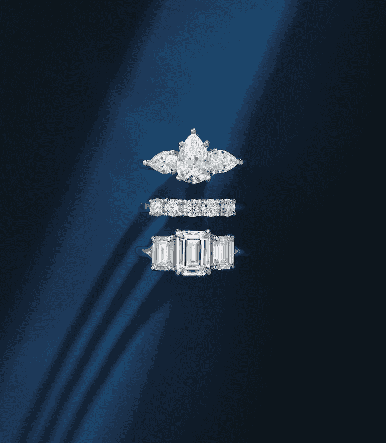 Elegant jewelry display featuring rings and gemstones